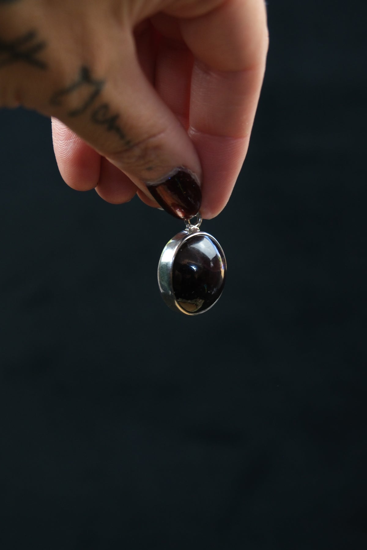 Round Star Garnet Sterling Silver Pendant
