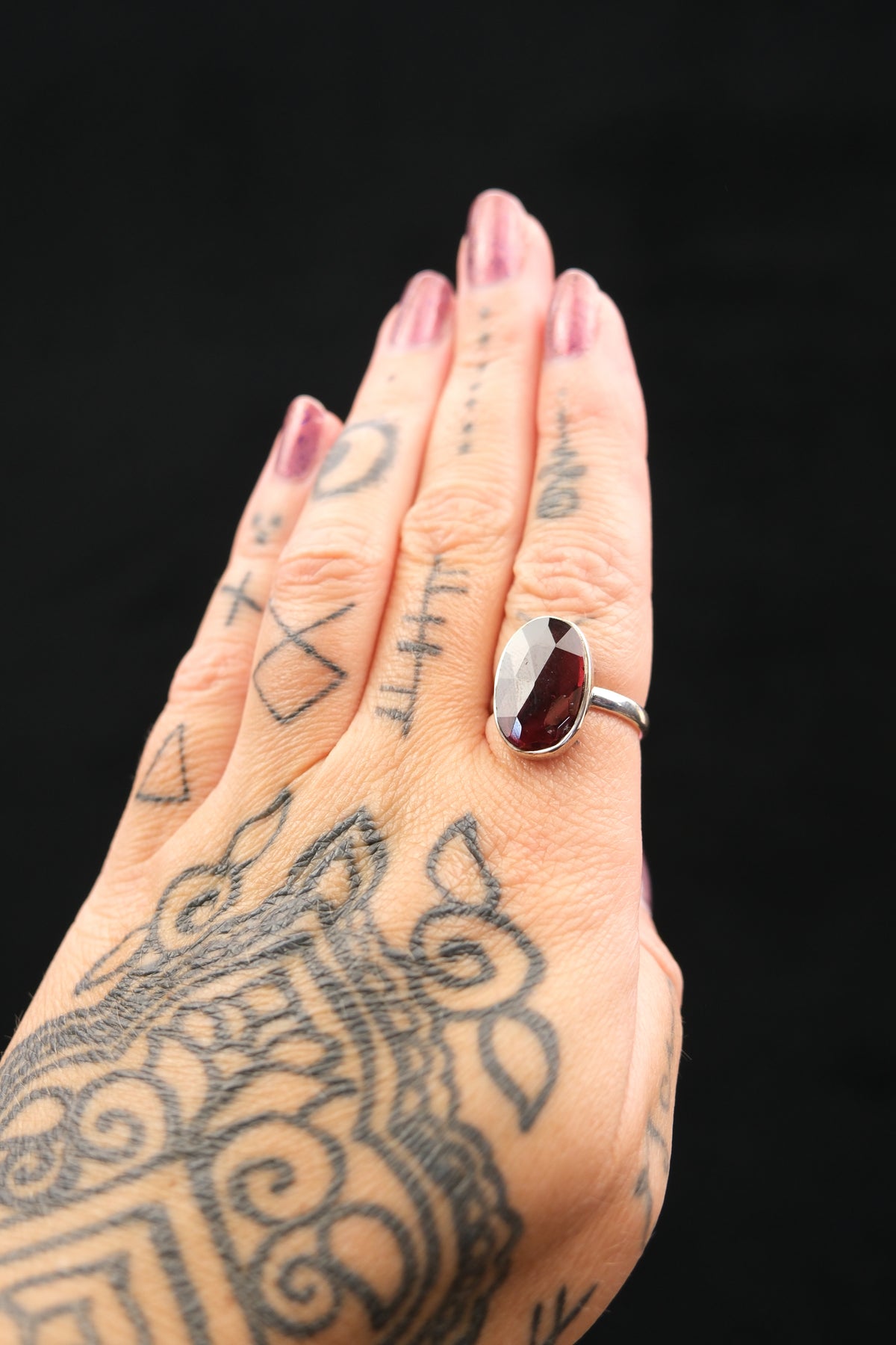 Faceted High Grade Garnet Ring