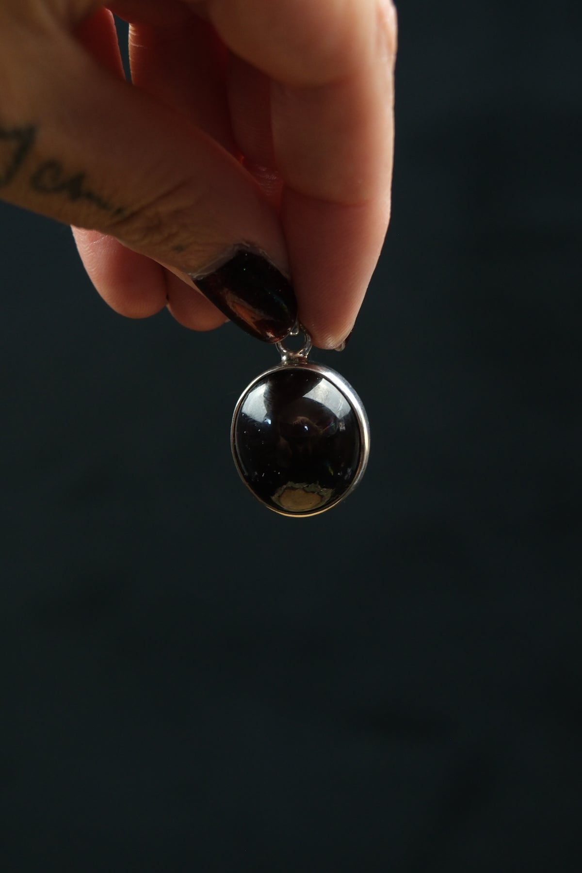 Round Star Garnet Sterling Silver Pendant