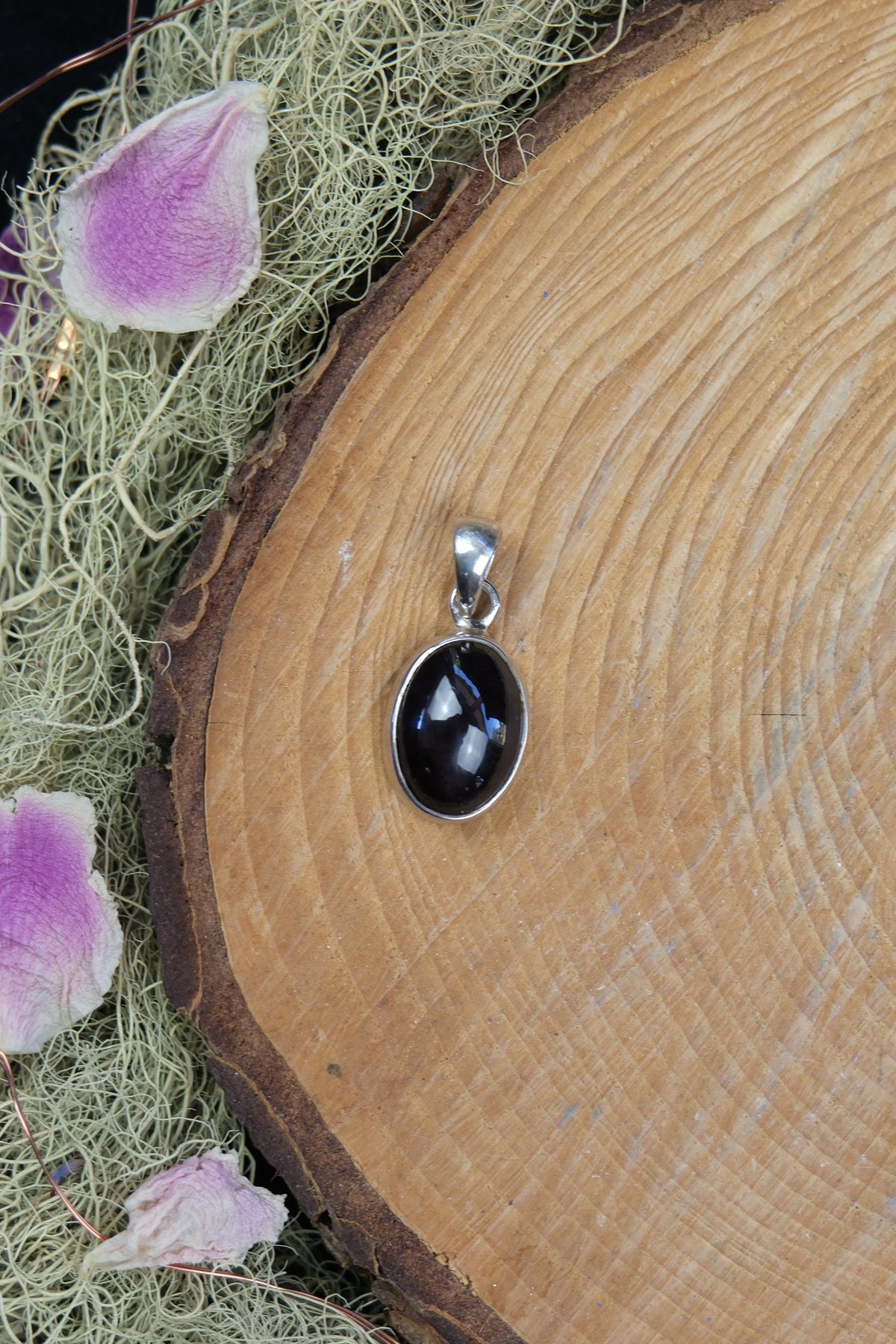 Oval Star Garnet Sterling Silver Pendant