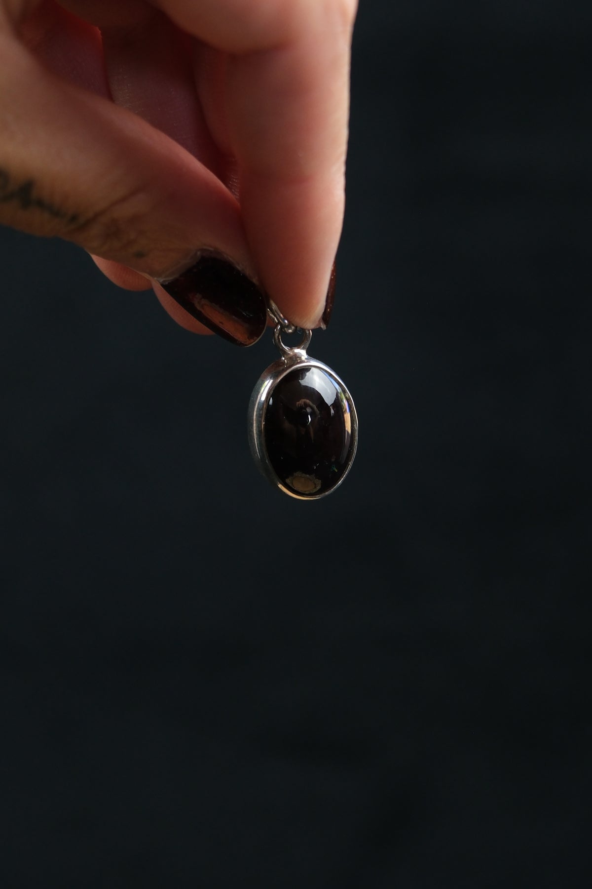 Oval Star Garnet Sterling Silver Pendant