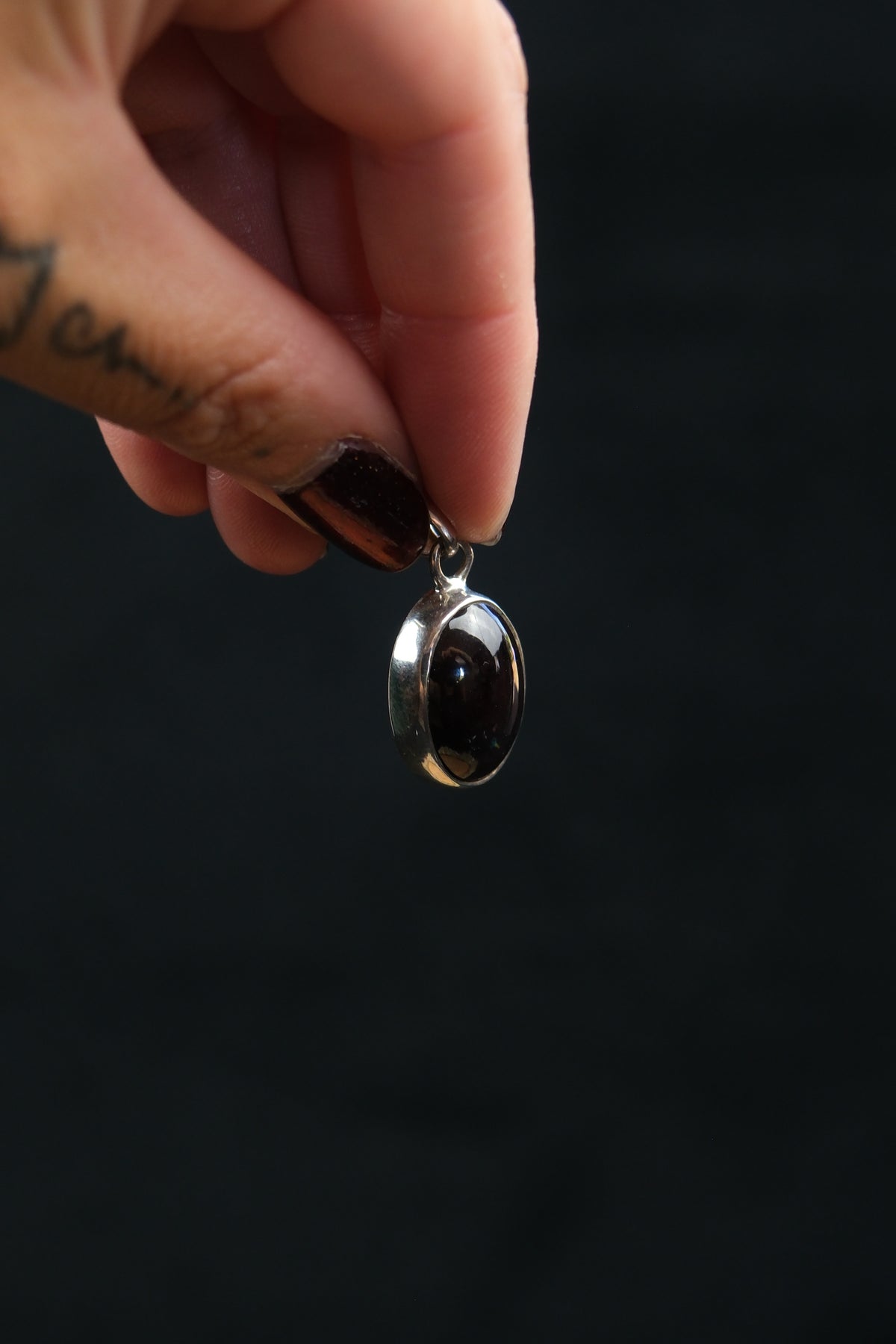 Oval Star Garnet Sterling Silver Pendant