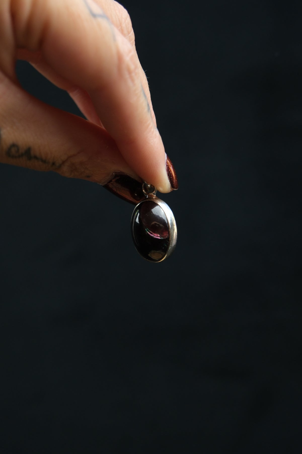 Oval Star Garnet Sterling Silver Pendant