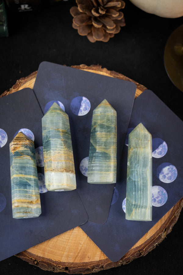 Lemurian Aquatine Calcite crystal point, Soothes the nervous system, Heal the energy system, Calming crystal.